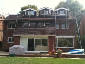 triple rear pitched roof dormers